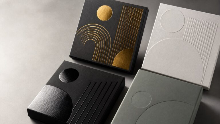 Custom packaging finishes showing gold foil, blind embossing, spot UV and matte lamination