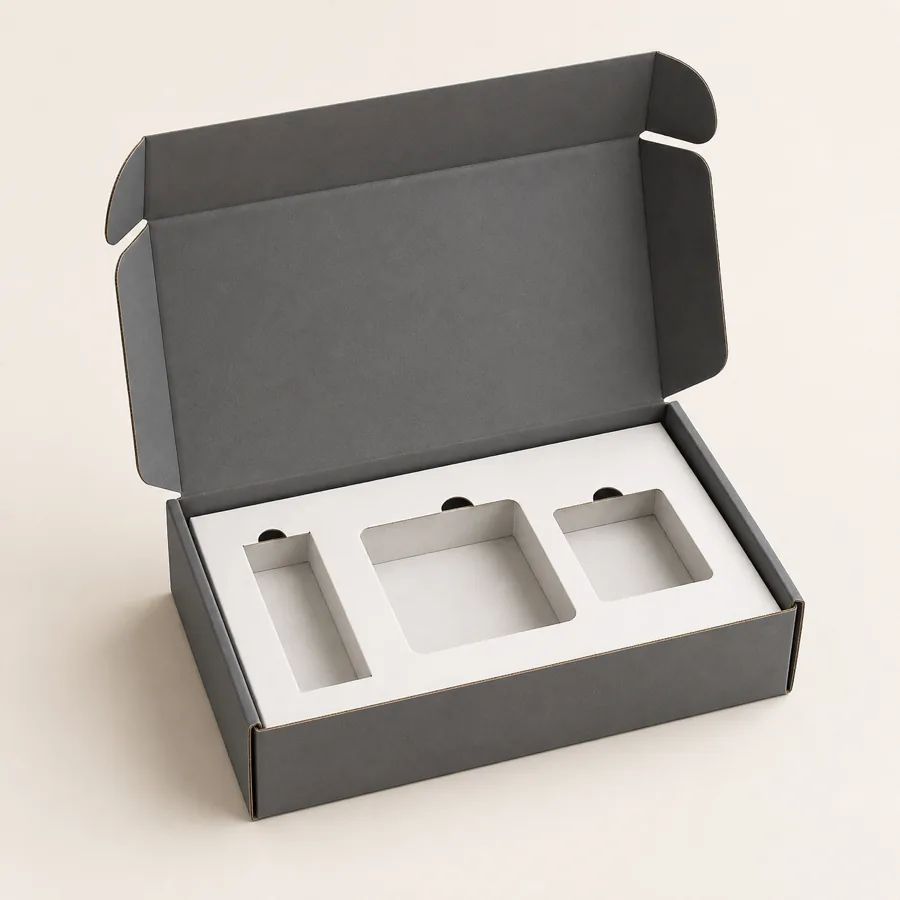 Graphite custom mailer box with fitted white paperboard insert